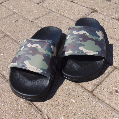 Slydes Caye Camo Slides with black soles.